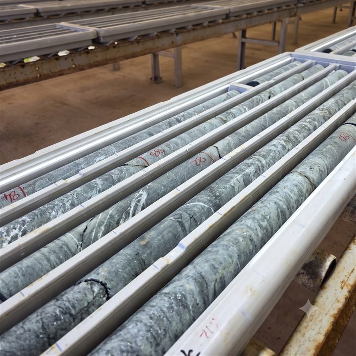 Trays of diamond drill core racked in a core shed